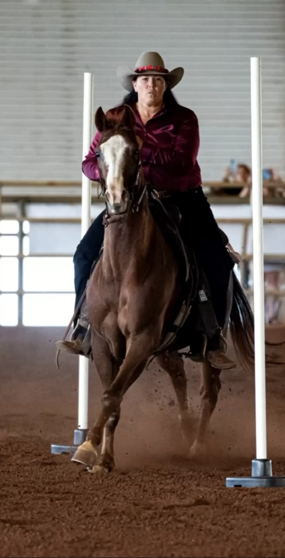 Polebending run in the indoor arena